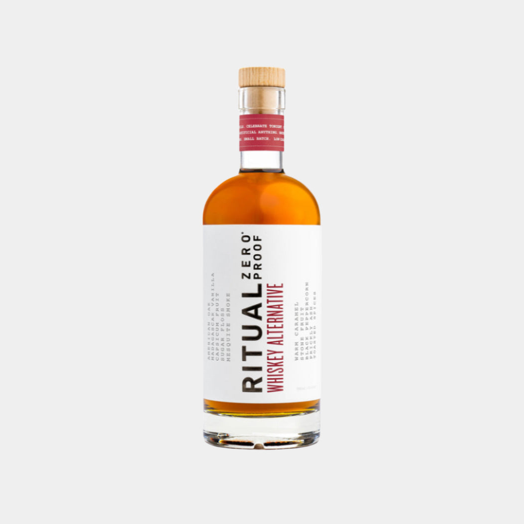 “Ritual Zero Proof Whiskey Alternative bottle – non-alcoholic whiskey”
“Non-alcoholic bourbon substitute for cocktails – Ritual Whiskey Alternative”
“Ritual Zero Proof whiskey bottle on bar cart with glass and garnish